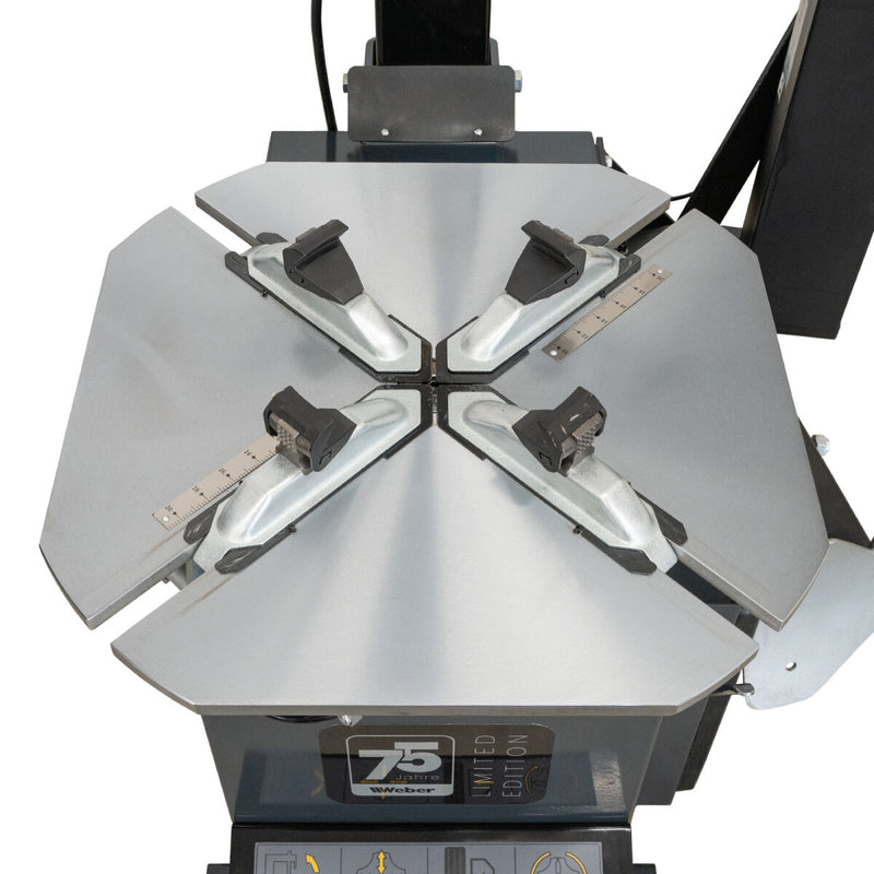 Weber STM-75 car tire mounting machine and STW-75 wheel balancer including right-hand auxiliary mounting arm