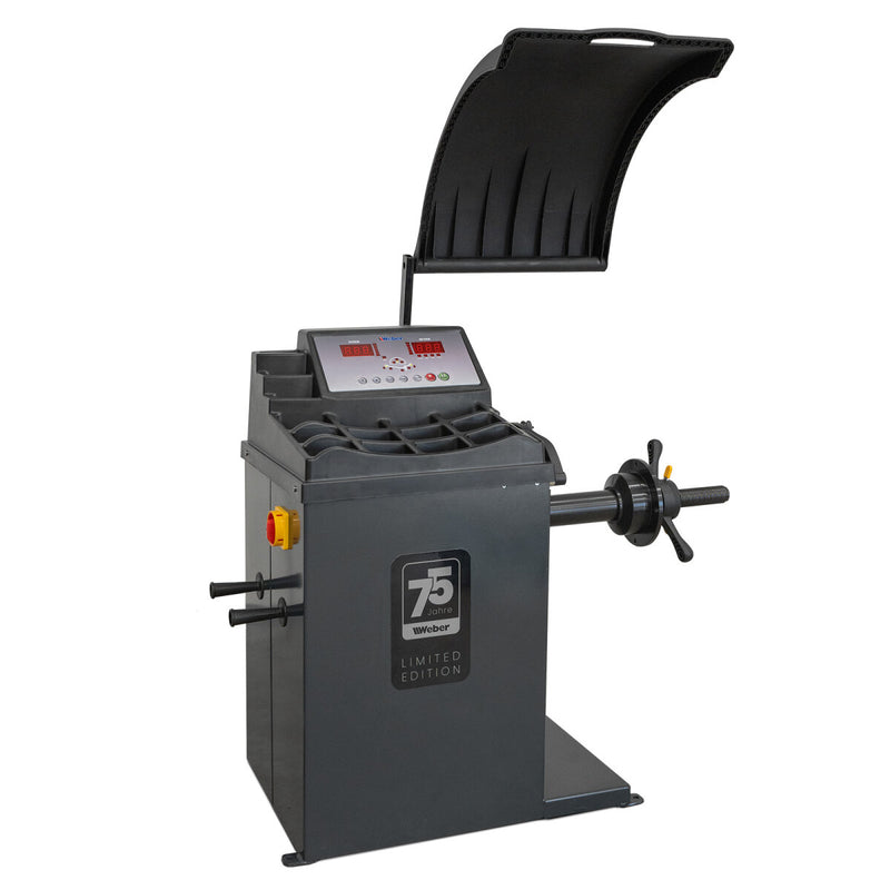 Weber STM-75 car tire mounting machine and STW-75 wheel balancer including right-hand auxiliary mounting arm
